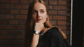 Elina Karimova BlackDress LongHair BrickWall - a brick wall behind her free wallpaper
