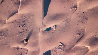 Snowy road footprints car land - amir zand free wallpaper