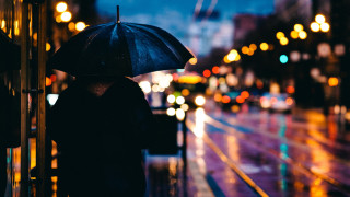 Night street umbrella city lights - a street holding free wallpaper