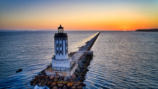 Lighthouse pier ocean sunset romanticism - radiant free wallpaper