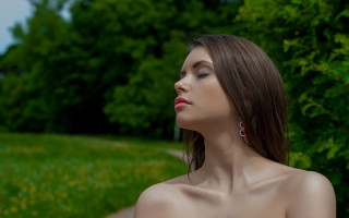 Woman closed eyes field nature - head and shoulders portrait free wallpaper