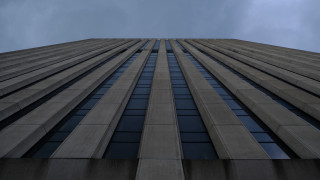 Brutalism building sky clouds blue - ultra wide angle free wallpaper