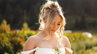 Woman white dress flower phone 2 - a white dress holding free wallpaper