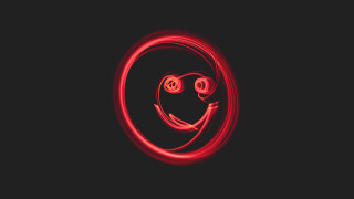 Red light smiley black background - a smiley face free wallpaper