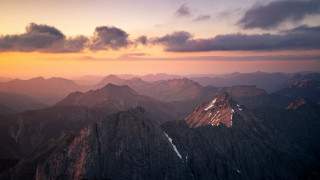 Mountain range sunset clouds cityscape 7 - a sunset in the background free wallpaper