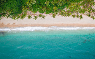 Beach sandy shore blue ocean - sandy free wallpaper