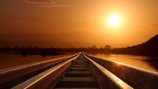 Train water sunset mountain city - the distance free wallpaper