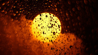 Yellow light rain window fire - a dark background free wallpaper
