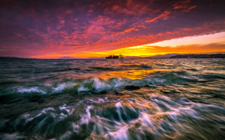 Sunset ocean boat mountains shore - mystical free wallpaper
