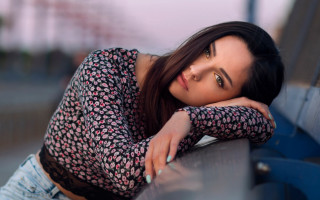 Woman leaning bench photorealistic portrait - a photorealistic painting free wallpaper
