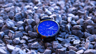 Watch rocks blue face yellow - a pile of rocks free wallpaper