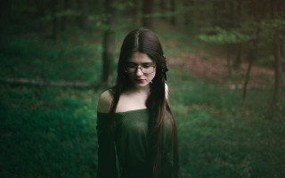 Woman glasses forest green top - glass free wallpaper