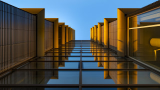 Yellow buildings blue sky yellow - modular constructivism free wallpaper