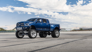 Blue truck cloudy sky mountain - a blue truck free wallpaper