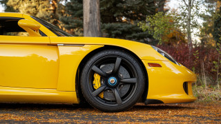 Yellow sports car wooded area - side profile free wallpaper