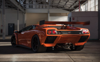 Orange sports car garage red - side profile free wallpaper