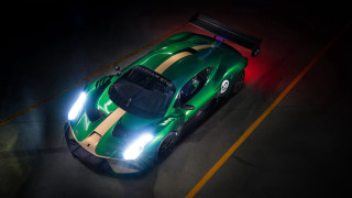 Green sports car red light 2 - a green sports car free wallpaper
