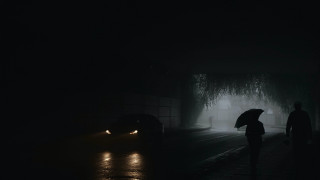 Person walking umbrella dark street - elsa bleda free wallpaper