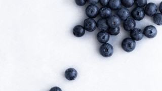 Blueberries minimalist stilllife planet moon - a white surface free wallpaper