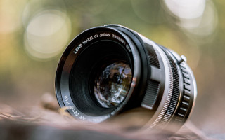 Camera lens closeup blurry background 2 - anamorphic free wallpaper for desktop