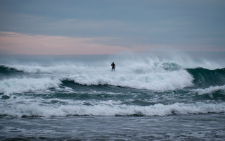 Surfboard figure ocean sunset cloudy - behind them free wallpaper
