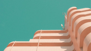 Bird perched building blue sky - the top of the building free wallpaper