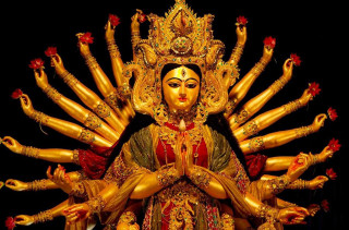 Woman statue many arms outstretched - a statue of a woman free wallpaper