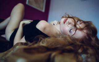Woman lying blurry flowing hair - the wind free wallpaper