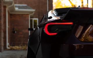 Car brick building red tail - a red tail light free wallpaper
