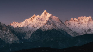 Mountain range snow capped peaks - sunset free wallpaper