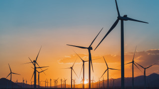 Windmills sunset mountains clouds ocean - a few cloud free wallpaper