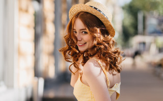 Woman hat smiling portrait curlyhair - outside free wallpaper