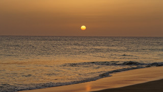 Sunset ocean beach waves boat - sunset free wallpaper