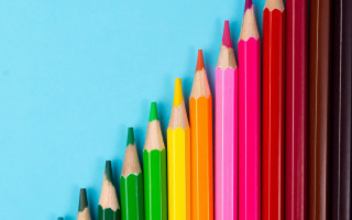 Colored pencils blue background middle - a childs drawing free wallpaper