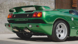 Green sports car red tail - a green sports car free wallpaper