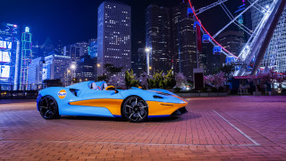 Blue yellow sportscar parkinglot city - vibrant color free wallpaper