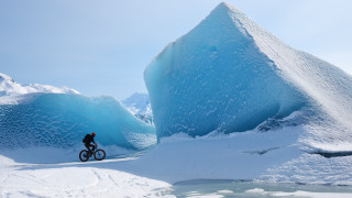 Iceberg biker snowy landscape blue - a person riding free wallpaper