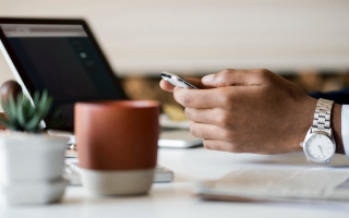 Person table phone laptop plant - les automatiste free wallpaper
