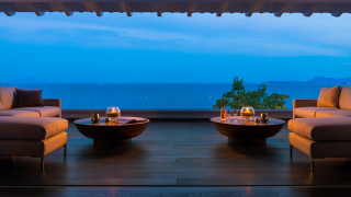Living room ocean night candles 2 - symmetrical balance free wallpaper
