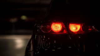 Car tail lights night street - a street light in the background free wallpaper