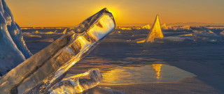 Frozen lake bench iceberg sunset - ice free wallpaper