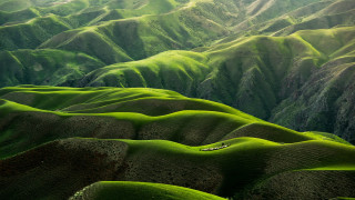 Green mountain range plane window 2 - a view free wallpaper