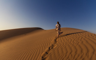 Woman desert sky longhair outdoors - sandy free wallpaper