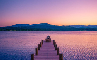Dusk mountain lake boat pink - a pink sky free wallpaper