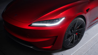 Red car parked lights hood - a red car free wallpaper