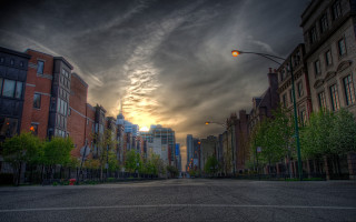 Cityscape street lamp clouds architecture - a cloudy sky free wallpaper