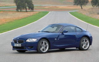 Blue sports car road grass 2 - a road next free wallpaper