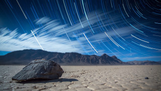 Desert rock startrail mountains spaceart - space art free wallpaper