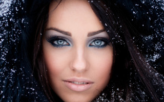Woman blueeyes blackhair snowfireworks night - snow flake free wallpaper