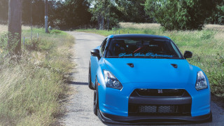 Blue sports car road grass - good free wallpaper